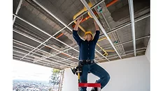Technician working on pipes