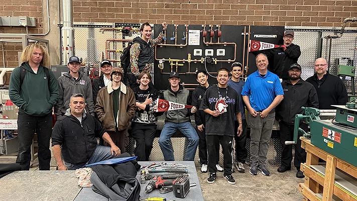 NIBCO and Webstone Donate Training Board to Support Skilled Trades Education Attendees of Red Rocks Community College posing with the donation from NIBCO and Webstone.