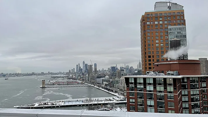 Case Study: Veritus Heat Pump Water Heater in New York Retrofit A view of a Manhattan apartment building.