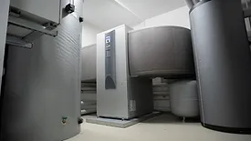 A heat pump system in a mechanical room.