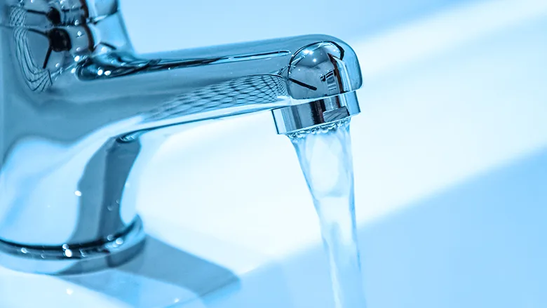 Water flowing from a tap.