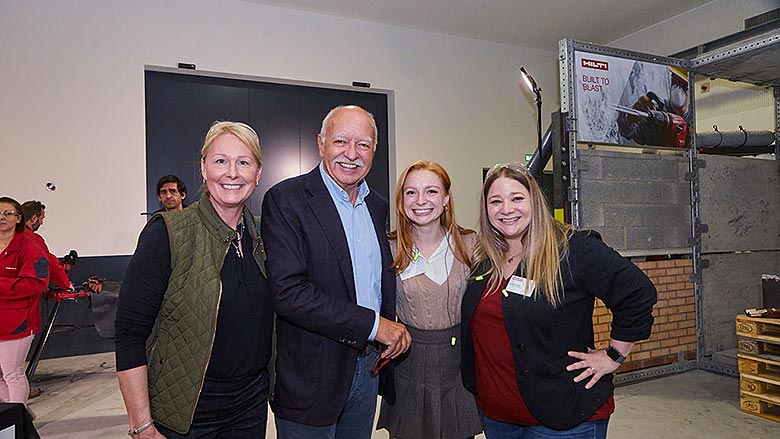 BNP Media employees pose for a picture with Hilti Group Chairman Michael Hilti.