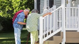 PM 1223 Guest Editorial Michael Copp. Elderly couple climbing stairs.