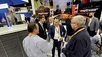 AHR Expo feature: 2023 AHR Expo in Atlanta attendees meet an exhibitor.