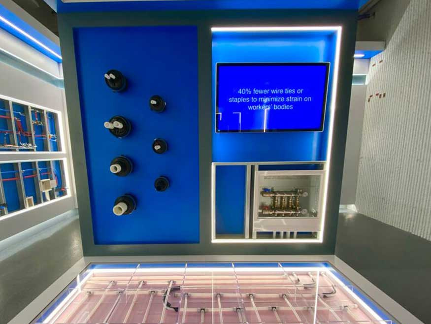 Uponor Experience Center product showcase room interactive display