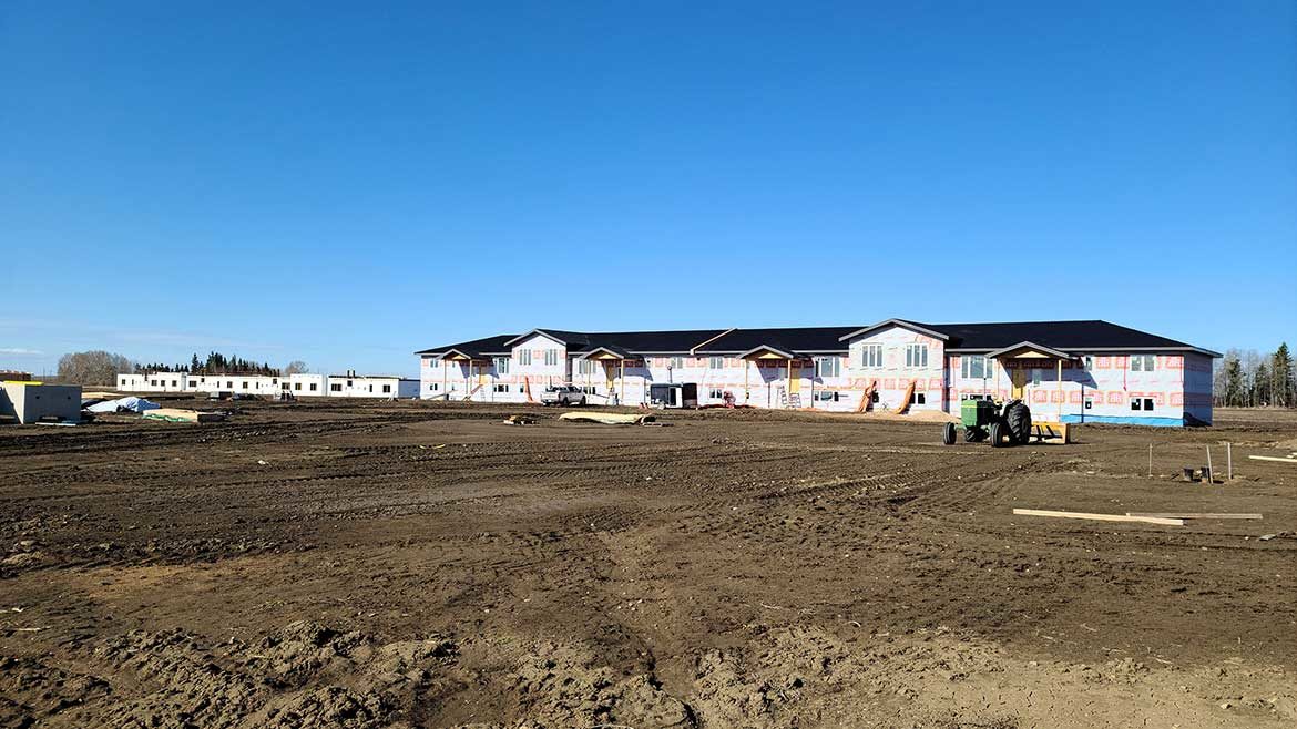 Hutterite colony's multi-family homes under construction.