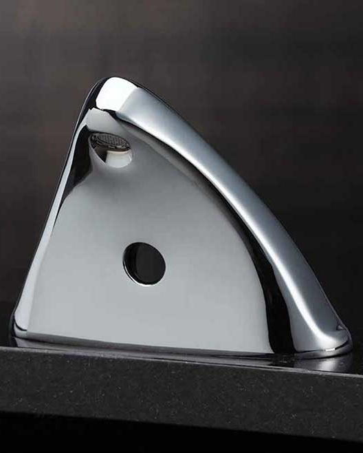 Close up of a ligature prevention faucet with a rounded and sloped for safety.