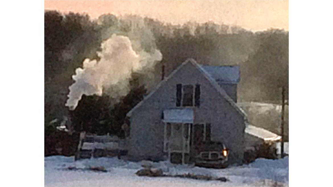 April John Siegenthaler column, Figure 1 of a smoke trail coming out of a house on a cold winter morning.