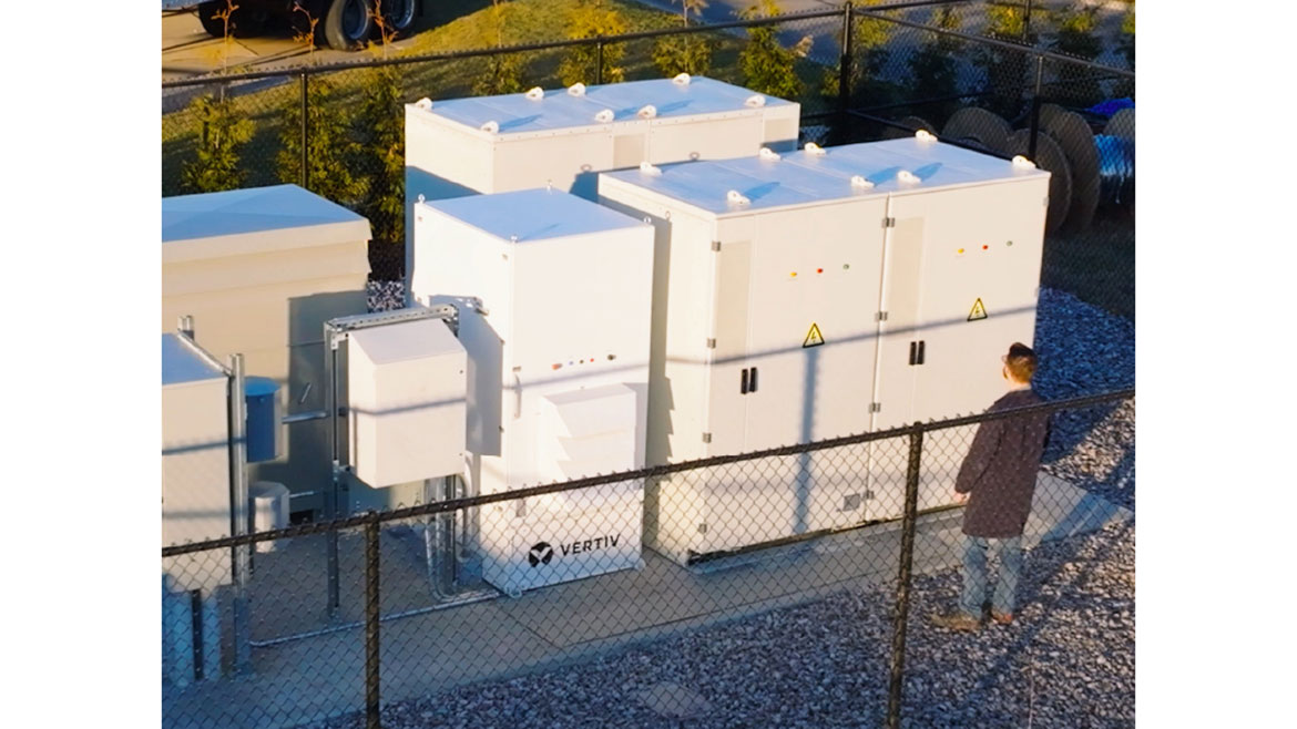 Man standing within a dynamic power campaign site