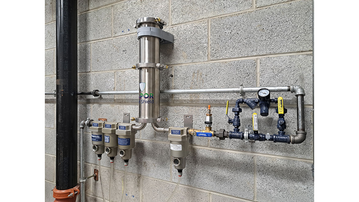 Vapor Pipe Shield by General Air Products mounted against a wall.
