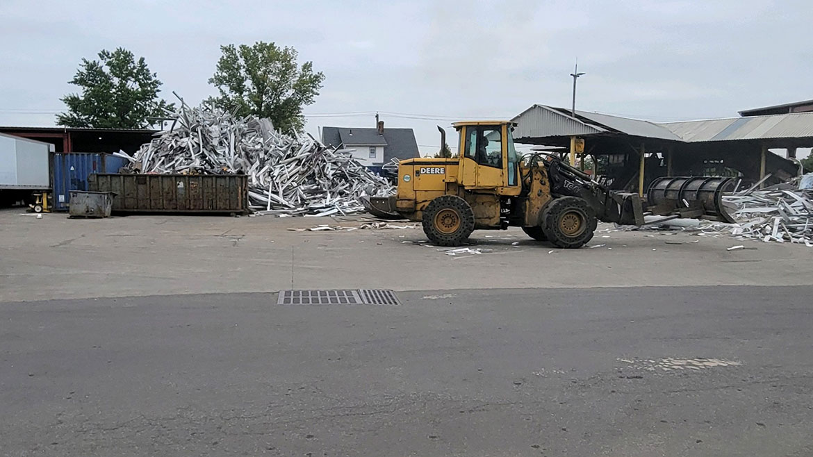 Heavy-duty trailer used to pick up new large equipment or load with scrap metal.