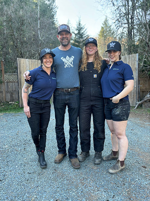 Mary Anne Bowcott (left), owner of Westcom Plumbing and Gas in Sooke, British Columbia, Canada