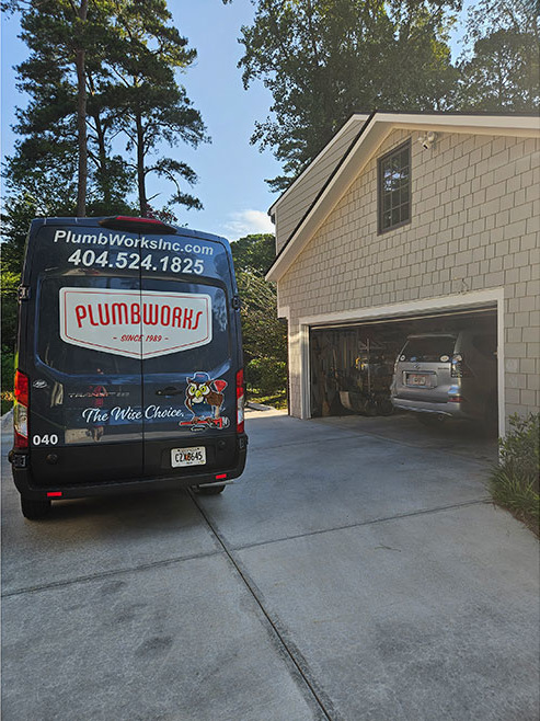 New van in the driveway of a house.