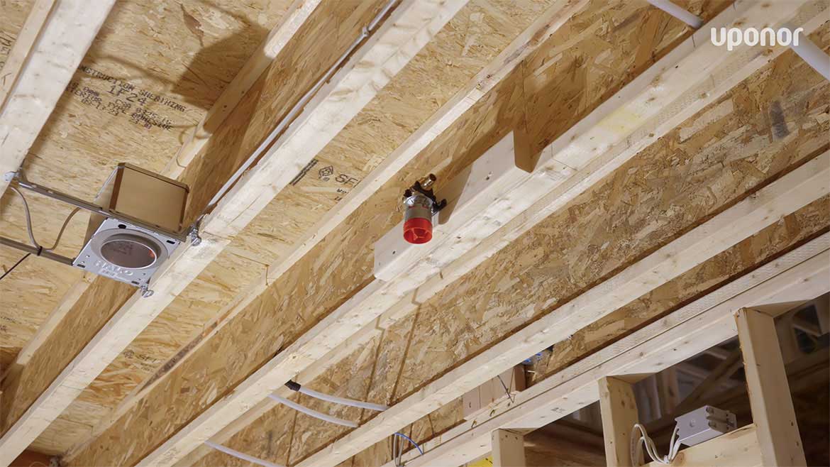 A sprinkler head on the ceiling