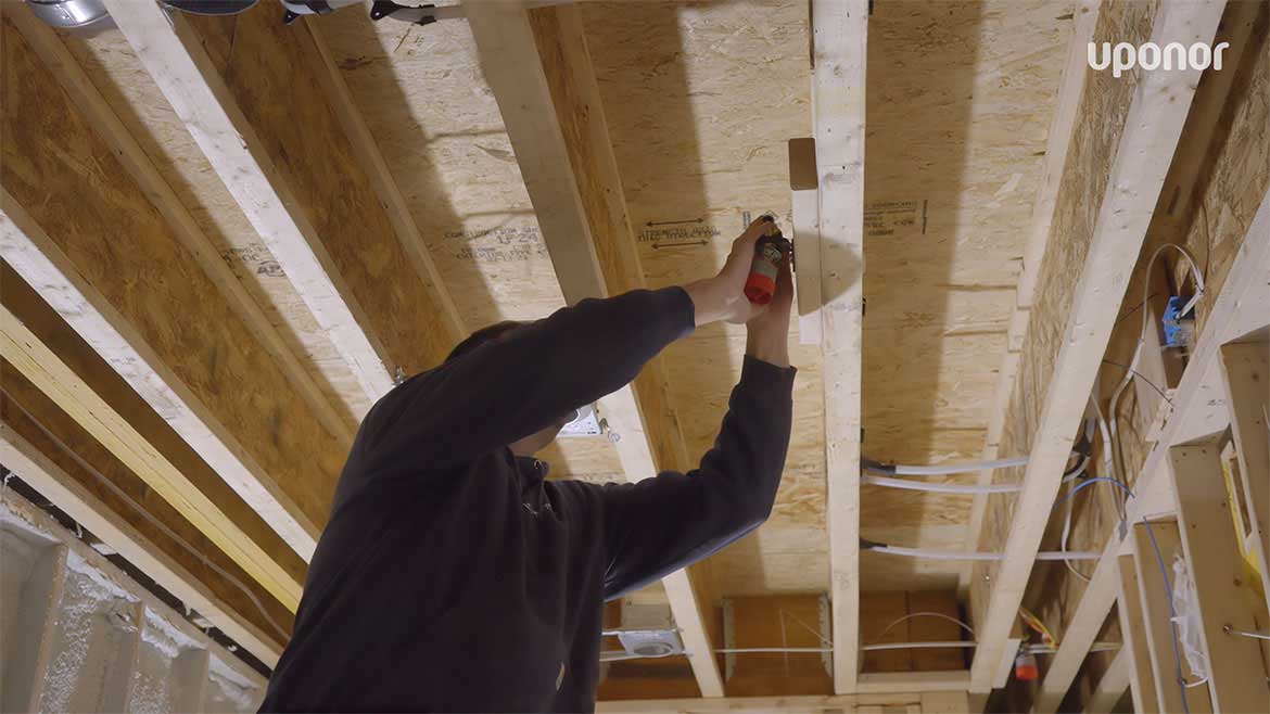 Plumber installing a sprinkler head