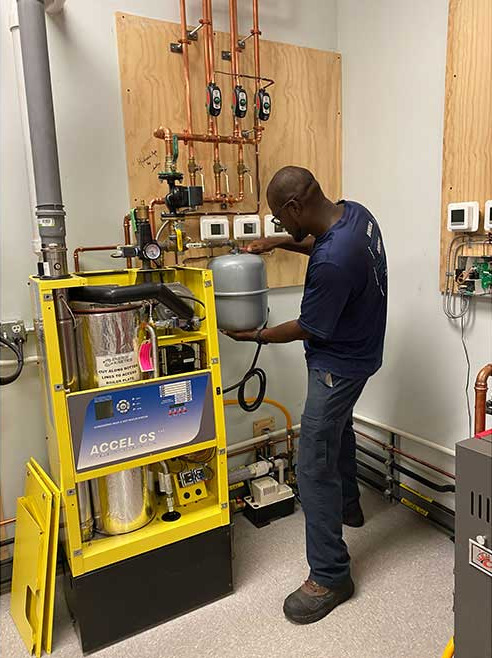 Eric Love, a student at PPATEC, working in the lab.