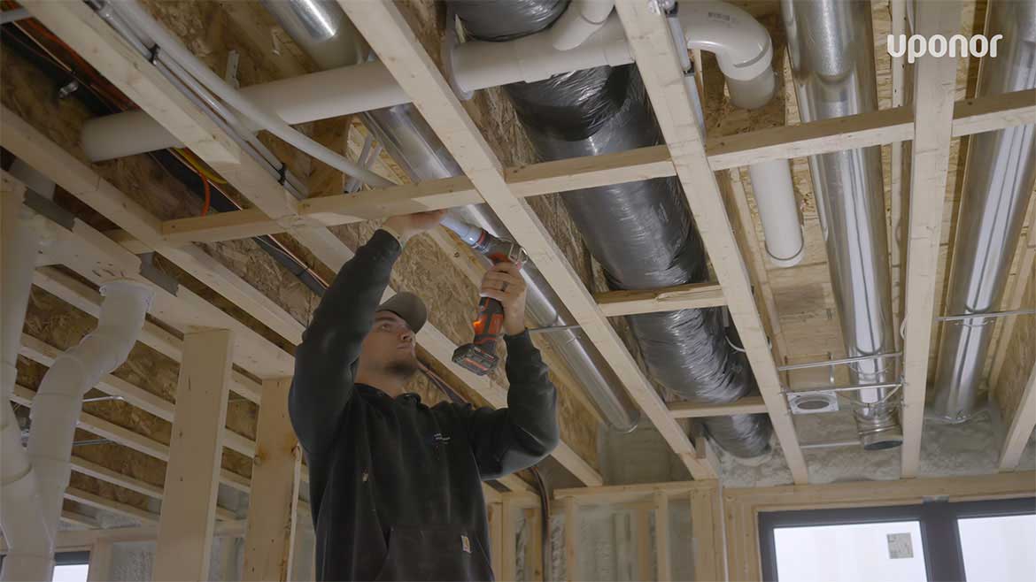 PEX pipe and expansion fittings are used throughout the Faust residence.