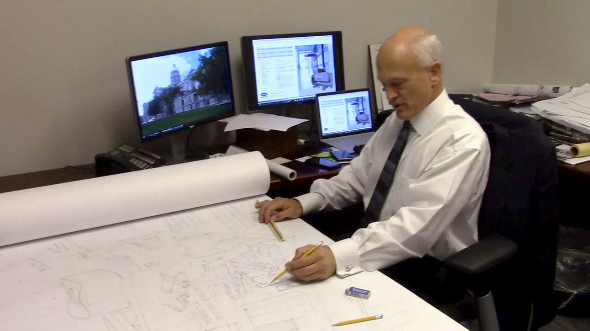 J. Michael Galway at his desk