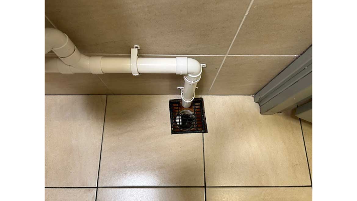 The discharge from a urinal bank.