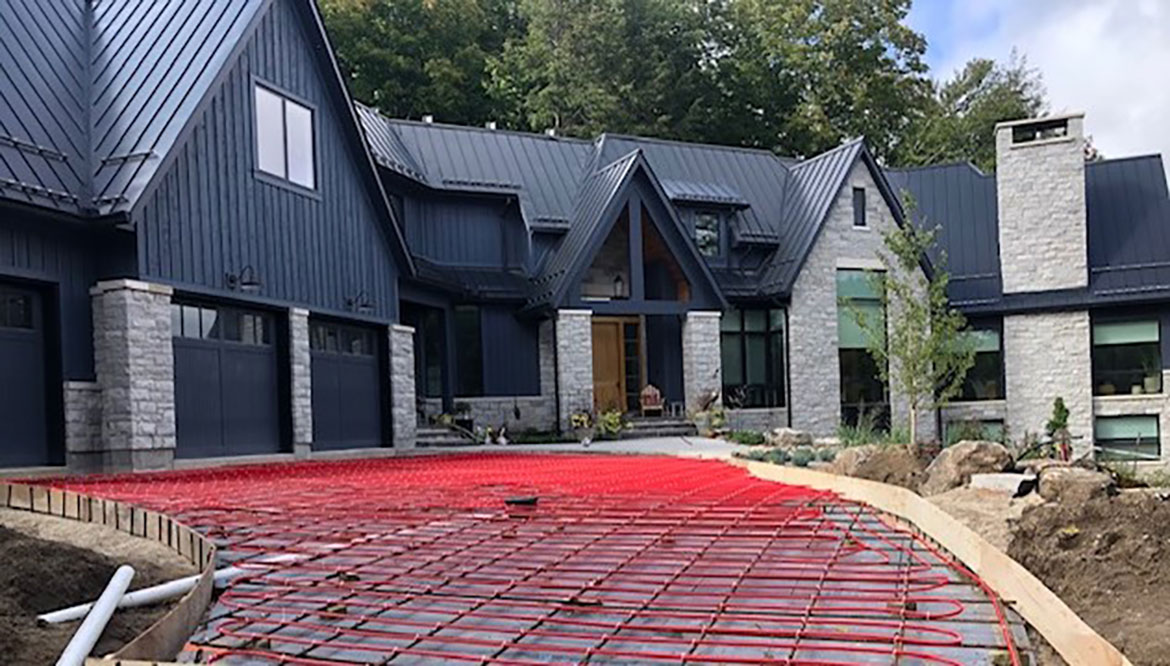 Mulmur residence with 4,000 square feet SIM system that includes nearly 5,500 feet of RAUPEX O2 barrier pipe.