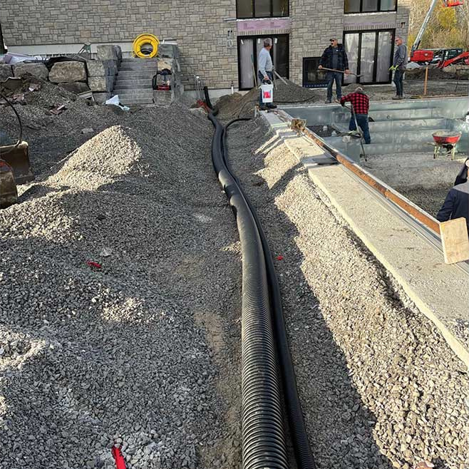 True North Mechanical Ottawa clubhouse exterior pipe installation