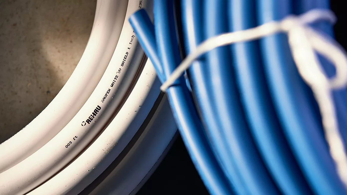 White and Blue RAUPEX UV shield PEXa pipes