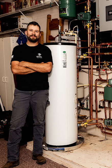Rader posing in front of installation