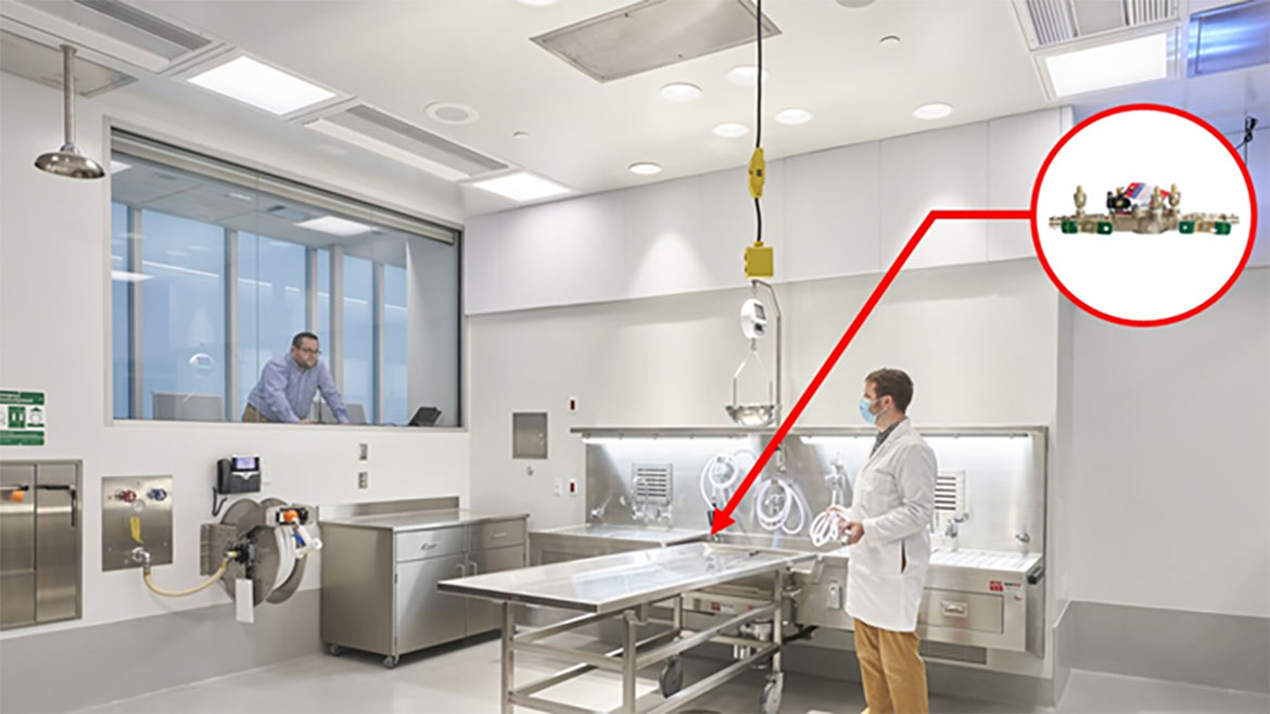 Medical Examiner’s autopsy station with backflow preventer.