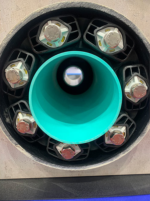 American Polywater pipe-sealing links around piping turns yellow when correct torque is achieved.