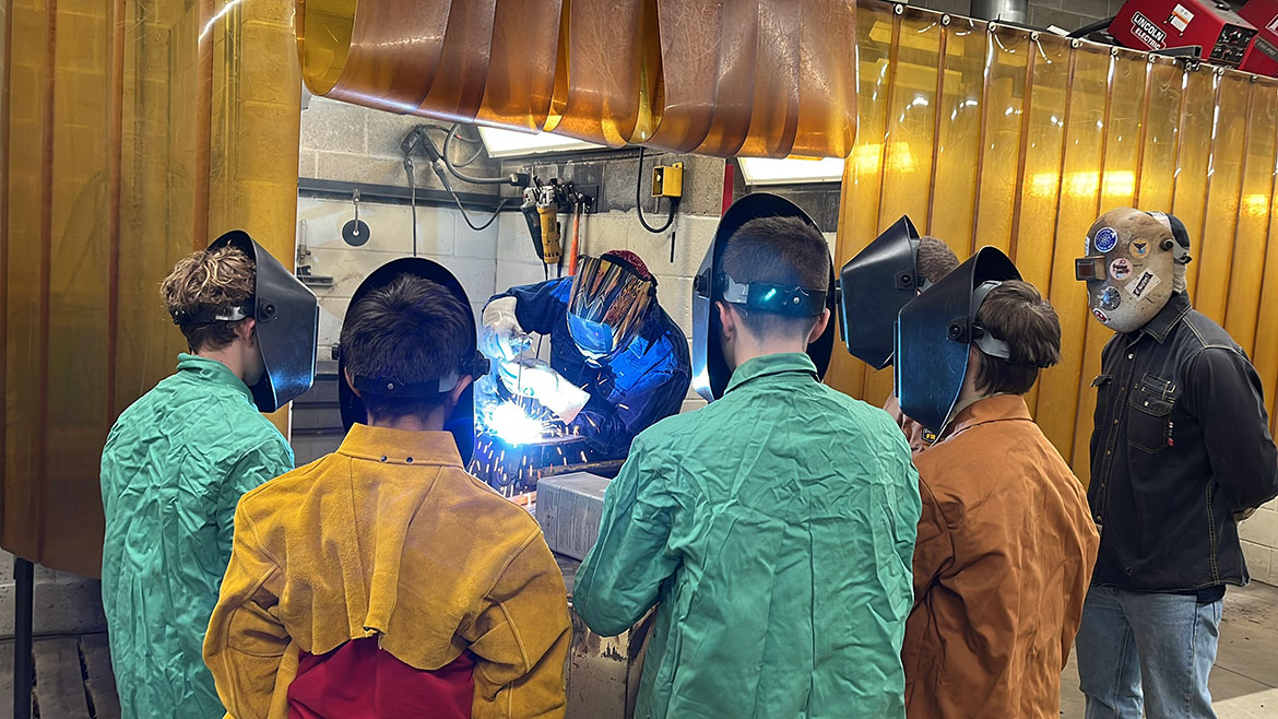 A local Rhode Island Boy Scout Troop earning their plumbing and welding badge by taking hands-on classes.