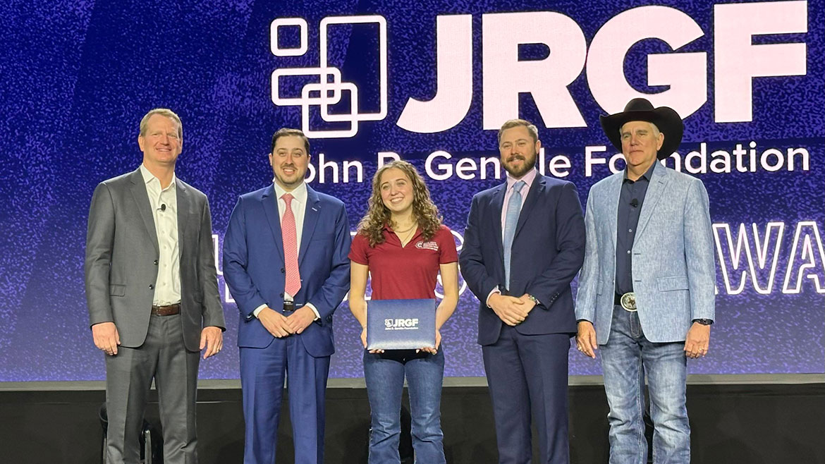 Douglas Bolton (center left) and Connor Bolton (center right) present the 2025 award to Shelby Gustafson of California State University.