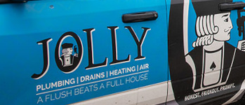 Jolly Plumbing, Drains, Heating & Air truck signage