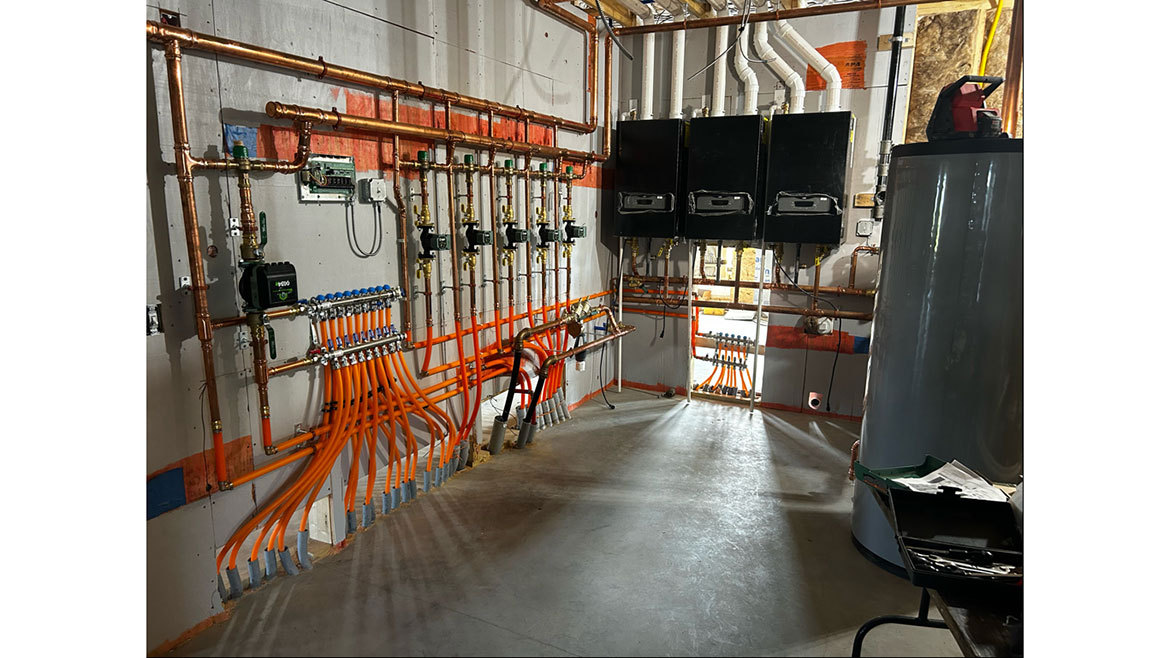  three HTP Elite Ultra boilers and an HTP Superstor Ultra Max indirect hot water heater.