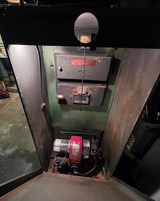 Internal components of an old furnace or boiler.