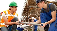 Two apprentices working in a construction site Giving apprentices a space to practice and make mistakes – and more importantly, learn from them – reduces the risk of errors on the job.