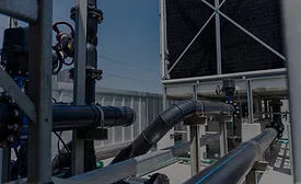 Industrial cooling tower, pipe system and valves infrastructure on rooftop