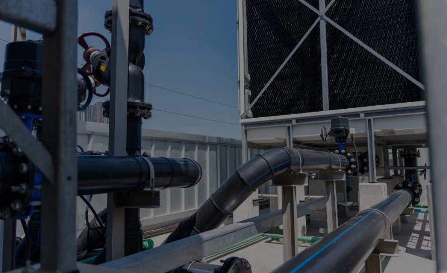 Industrial cooling tower, pipe system and valves infrastructure on rooftop