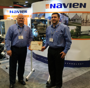 Navien's Brian Fenske and Eric Ashley with the company's award at the 2014 Comfortech in Nashville.