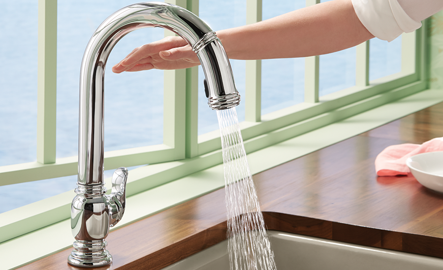 Kohler’s Beckon touchless kitchen faucet turns on and off with a wave of your hand.