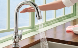 Kohler’s Beckon touchless kitchen faucet turns on and off with a wave of your hand.