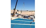 Workers lower panels into place on topof Desert Mountain High School in Scottsdale, Arizona