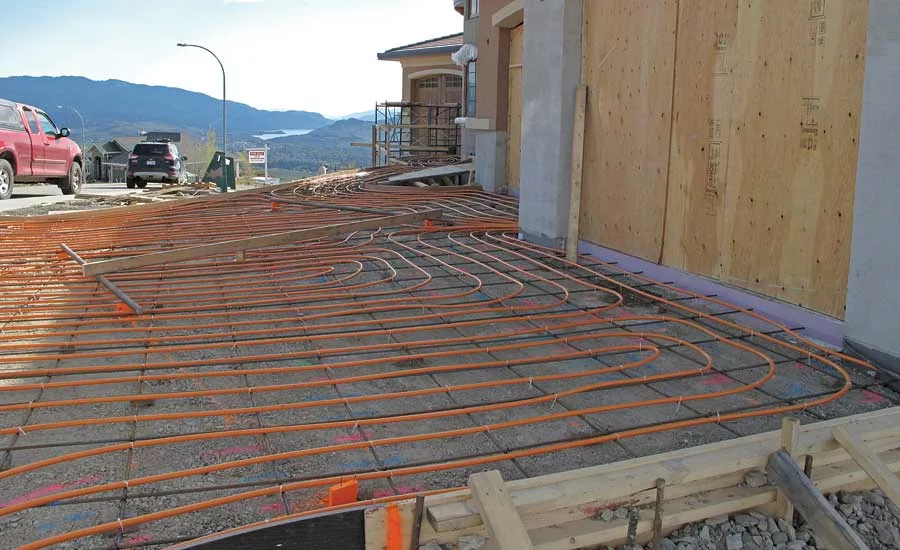 Radiant tubing is installed beneath the driveway of Vernon