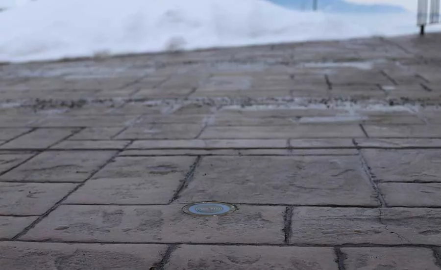 One of the Gibbs’ driveway’s snowmelt sensors is visible