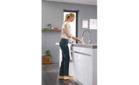 Grohe's LadyLux3 Café kitchen faucet features foot control technology.