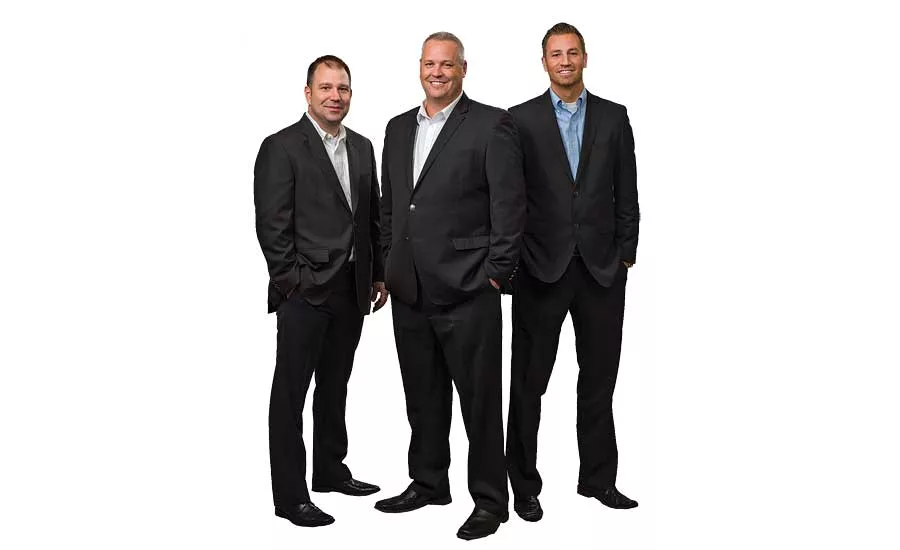 Jay Hassel (center), president and COO of Noritz America, poses with Vice President of Sales and Marketing Jason Fleming (right) and National Sales Manager Jason Corey