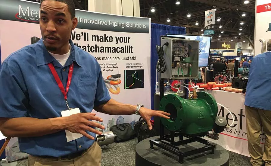 Metraflex Co. Product Manager Jeremy Wright showcases the style ABD strainer at the 2017 AHR Expo