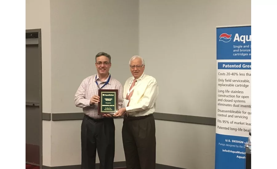 Hollabaugh Brothers & Assoc. President Chad Hollabaugh (left) accepts the Trailblazers Award for the highest sales as a first-year rep from AquaMotion President Hans Kuster. Photo credit: AquaMotion