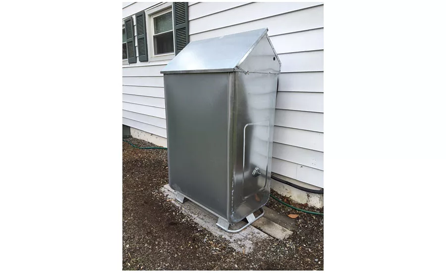 A rain shield was installed to protect the new outside tank