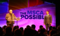Actor and industry advocate John Ratzenberger (left) speaks to attendees of MSCA CONNECT Oct. 18 in Boca Raton, Florida, as MSCA outgoing Chairman Chris Carter looks on.
