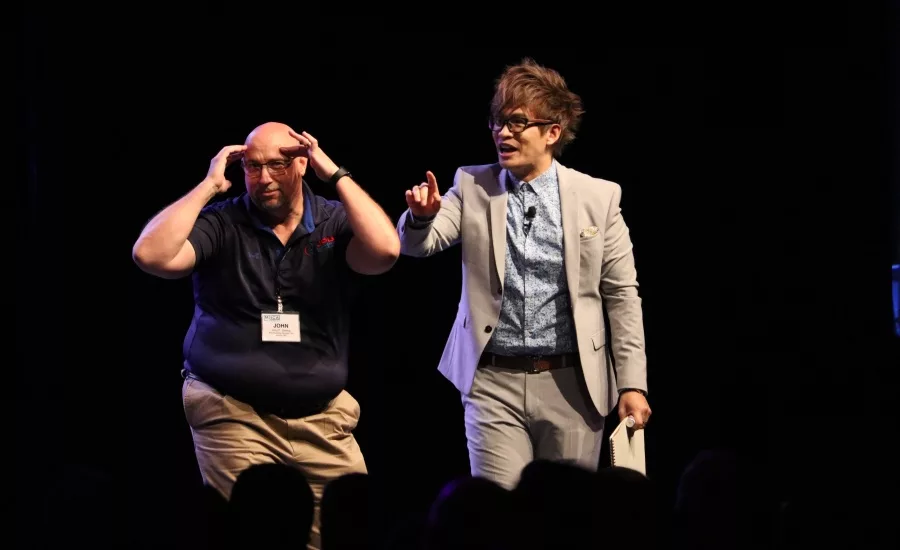 Entrepreneur-magician and keynote speaker Vinh Giang (right) mixes humor, magic, and motivational speaking to inspire attendees of MSCA’s CONNECT 2017.